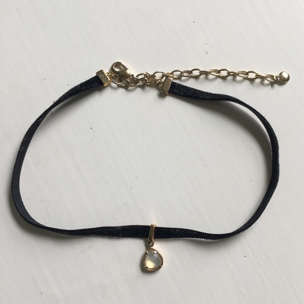 Thin black velvet choker with clear drop gem